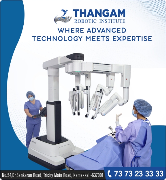Healthcare professionals using advanced robotic surgery equipment at Thangam Robotic Institute.