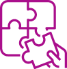 Hand placing a puzzle piece into a puzzle.