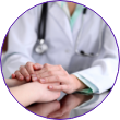 Doctor holding a patient's hand